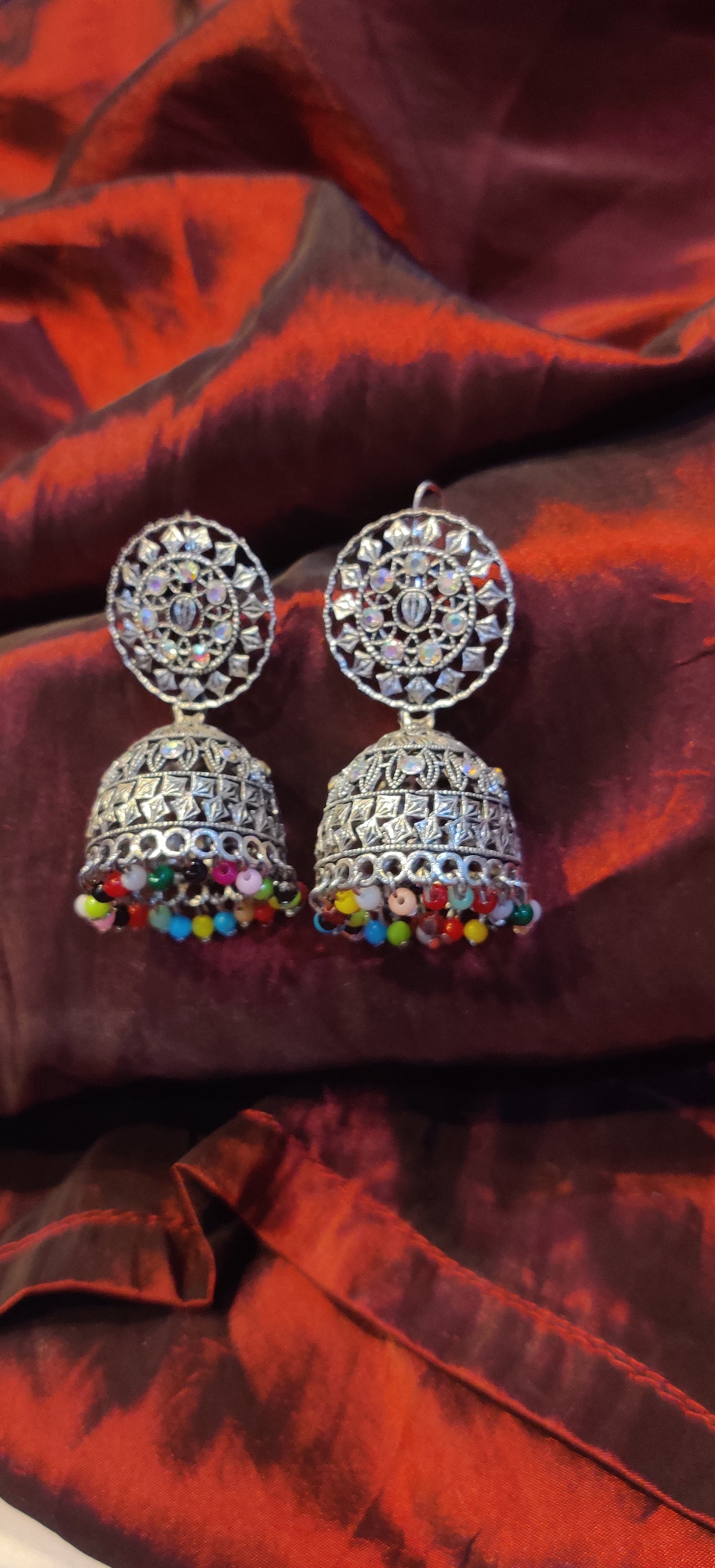 Traditional Silver Jhumka Earrings with Colorful Bead Detailing