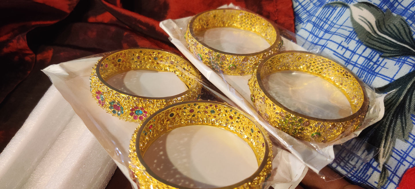 Heavy Embellished Gold water Bangles with Multicolor Stones – 2 Pieces (Size 2.6)